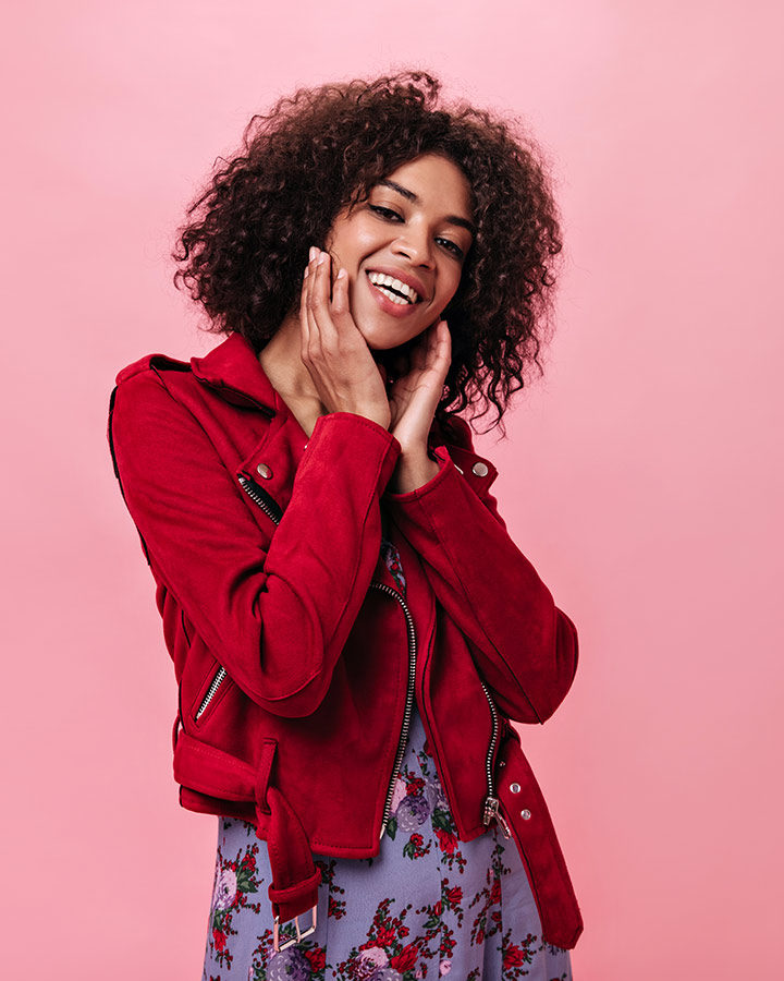 Charming Girl Red Jacket Laughs Pink Wall